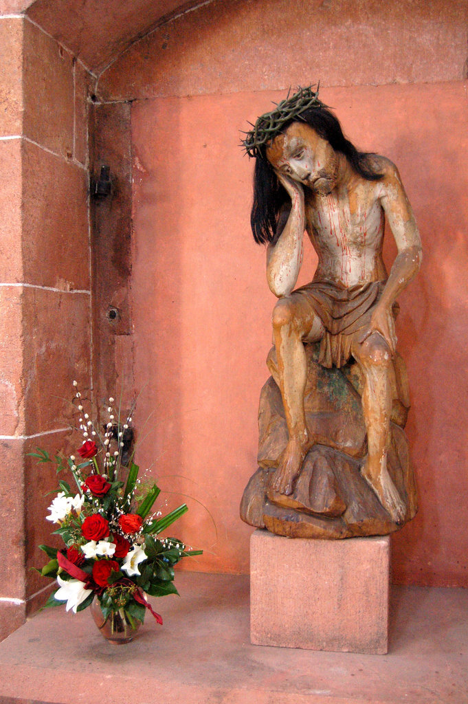 Jesuo rigardas florbukedon - Jesus, einen Blumenstrauß betrachtend