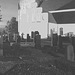 Église & cimetière de soir - Båstad -  Suède /  Sweden.   Octobre 2008- N & B avec mur gris /  B & W with grey wall added