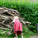 Lina sawing firewood, Torben "sawing" the green