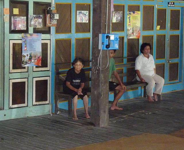 Inside the longhouse- with Public Telephone