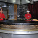 Mongolian barbecue is being prepared in front of your eyes