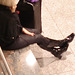 Croisé de bottes et cellulaire / Cell phone and crossed boots -  Aéroport de Montréal /  Montreal airport -  15 Novembre 2008.