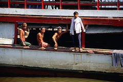 Fisher men and woman watching to tourists