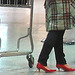 La Dame aux escarpins rouges /  Lady in red heels -  Montreal airport /  Aéroport de Montréal