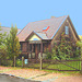 Maison suédoise avec ciel bleu photofiltré. 21-10-2008