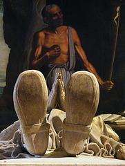 At Vasco's feet