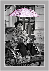 the lady with the pink umbrella