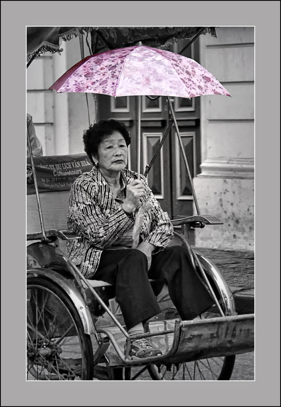 the lady with the pink umbrella