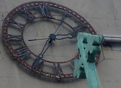 Rusted Clock and Patina-Covered Cross