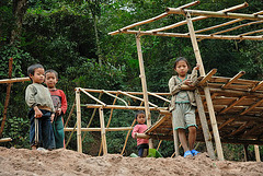 Kids play at the Nam Ou riverbank