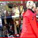 Choklad blond swedish Lady in red with sexy high-heeled boots / Blonde en rouge avec bottes de cuir à talons hauts. - Postérisation et cadre rouge