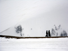 Priests Heading Through the Snow