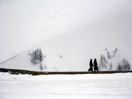 Priests Heading Through the Snow