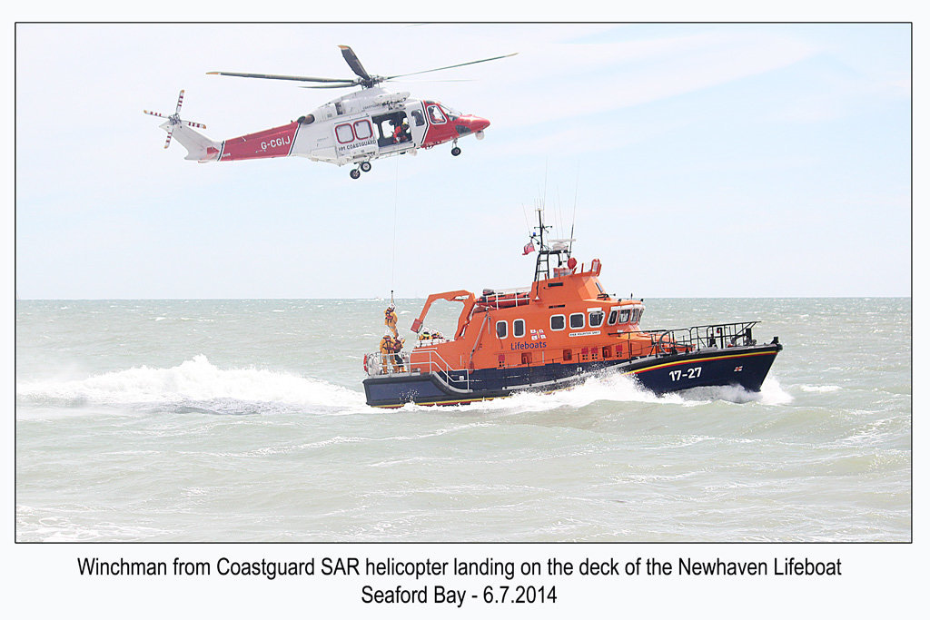 Winchman lands on Lifeboat - RNLI & Coastguard Joint Exercise - Seaford Bay - 6.7.2014