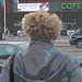 Street corner curly Mature Lady in sexy high-heeled boots and jeans /  Dame mature aux cheveux bouclés en bottes à talons hauts et jeans -  Copenhage, Danemark.  19-10-2008-  Postérisation