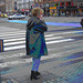 Street corner curly Mature Lady in sexy high-heeled boots and jeans /  Dame mature aux cheveux bouclés en bottes à talons hauts et jeans -  Copenhage, Danemark.  19-10-2008- Postérisation