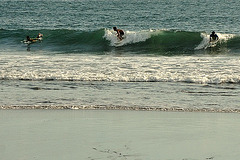 Surf riding at the Canggu beach