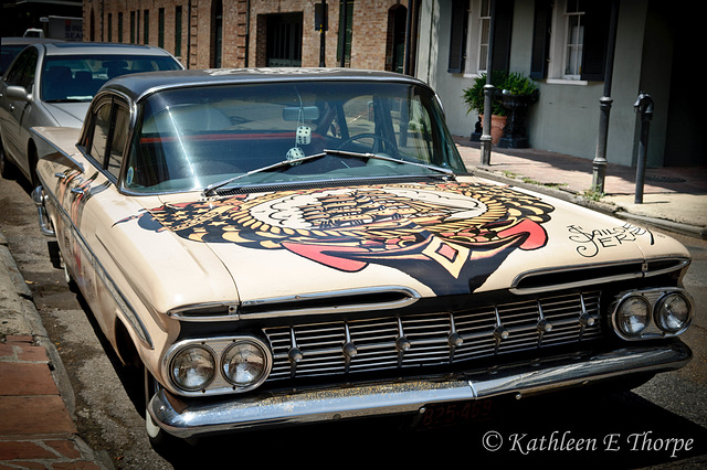 Norman "Sailor Jerry" Collins' '59 Chevy Bel Air.  Norman Collins is considered the father of old school tattooing.  Sailor Jerry Rum is named after him.