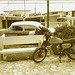 Old car and motorcycle / Voiture ancienne et moto cubaine  -  Varadero, CUBA.  9 février 2010. - Sepia
