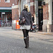 Typique jeune blonde suédoise en mini-jupe et bottes à talons hauts / Typical Swedish blonde in high-heeled boots and miniskirt