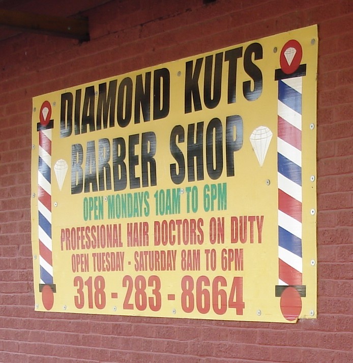 Diamond kuts barber shop sign /  Salon de coiffure louisianais - Bastrop /  Louisiane. USA - 08 juillet 2010