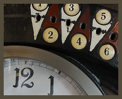Detail of a time clock about 1900/Detail einer Stechuhr etwa um 1900