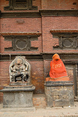 Hanuman sculpture and peacock windows in Patan