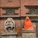Hanuman sculpture and peacock windows in Patan