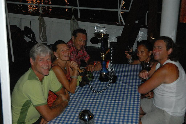 Helmut, Susi, Herbert, Reza and Franz are Shisha smoking after returning to the Naval