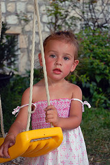 Lovely girl on her swing in Dubrovnik
