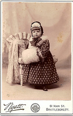 Little Girl in Fur Coat With Muff