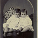 Twin Boys with Striped Stockings
