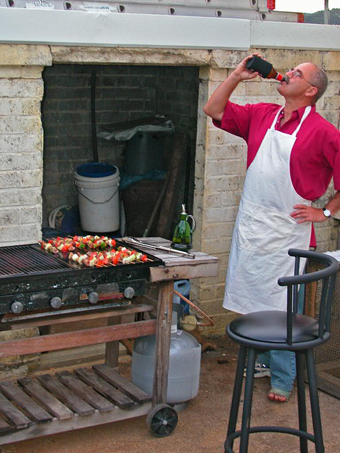 Matthew preparing barbecue