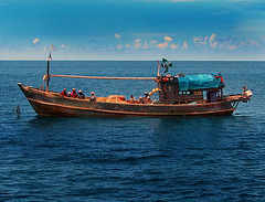 Simple fishing vessel in Burmese waters