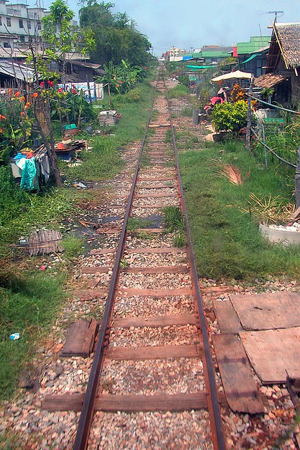 Rail track through house backyards