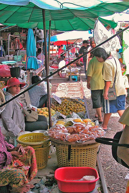 Fruit stall and passing customers