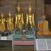 Buddha images and a dignitary wax work