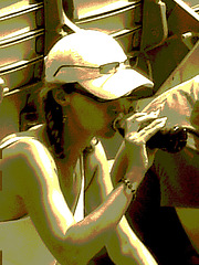 A3  sexy hatter's crossed legs and feet / La Dame à la casquette aux jambes et pieds sexy / Tennis Rogers - Montreal, Québec. CANADA /  July 27th 2008 - Sepia postérisé