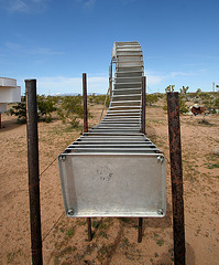 Noah Purifoy Outdoor Desert Art Museum - Sixty-Five Aluminum Trays (9845)