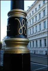 black and gold lamp post