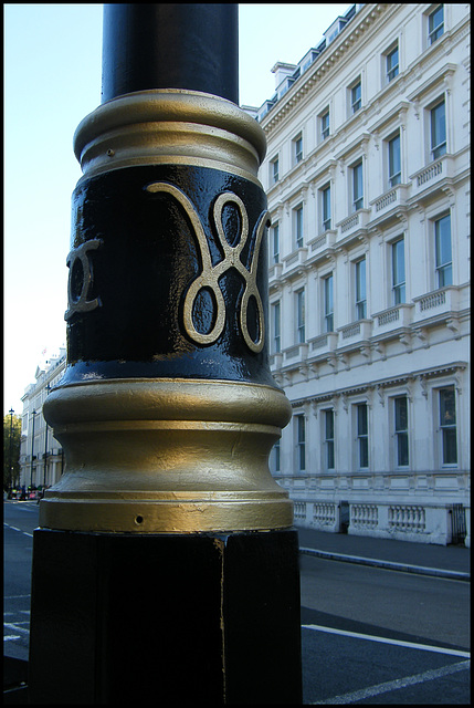 black and gold lamp post