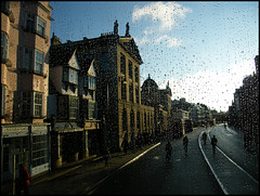 high street in the morning rain