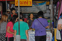 Market vendor sells northern gastronomic specialities