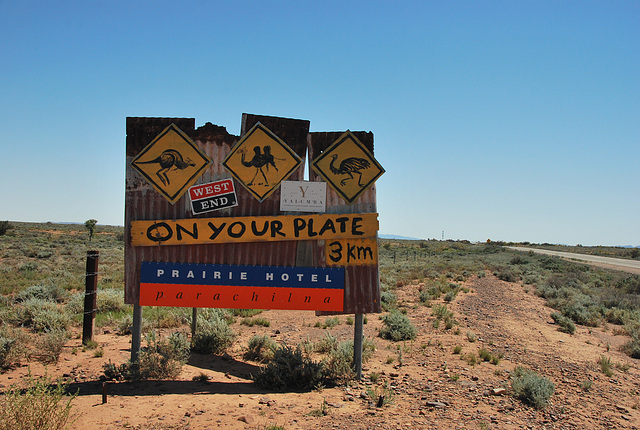 Sign for food ahead...kangaroo, camel and emu! Desert Australia