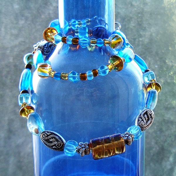 blue bottle and glass beads