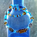 blue bottle and glass beads