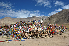 Ladakh: Pass with Buddhist mani stones and prayer flags
