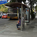 Bus stop in high heels / Attente de bus en talons hauts.