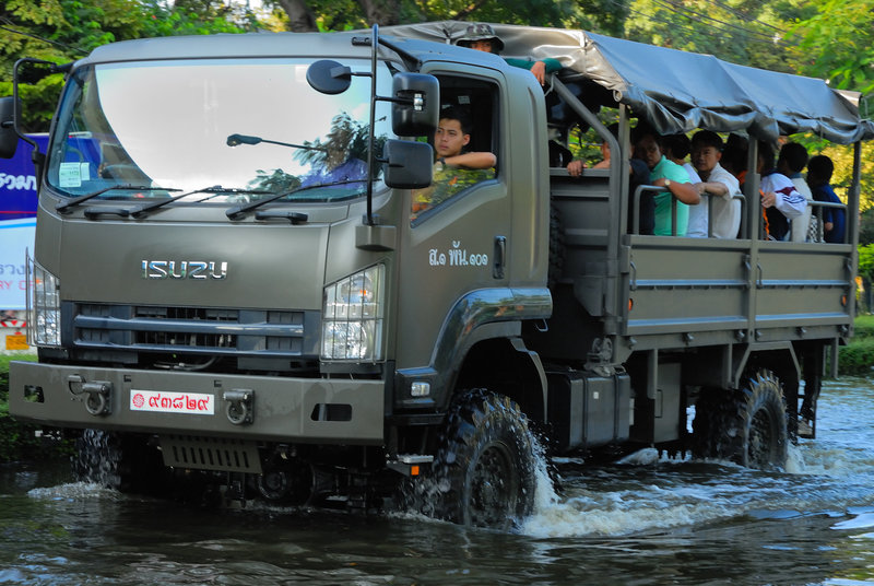 Army truck evacuating residents