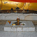 An altar in front of the reclining Buddha